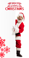 Image showing Emotional Santa Claus greeting with New Year 2021 and Christmas. Flyer with copyspace