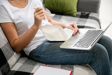 Image showing Remote working from home. Workplace in home office with PC, devices and gadgets.