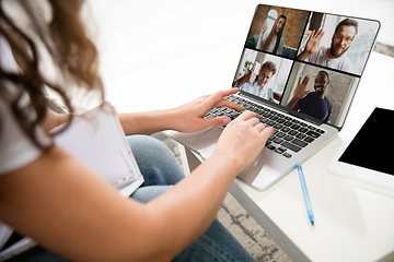 Image showing Remote working from home. Workplace in home office with PC, devices and gadgets.