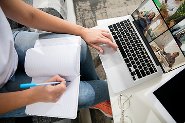 Image showing Remote working from home. Workplace in home office with PC, devices and gadgets.