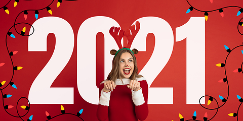 Image showing Emotional Santa Claus\' deer greeting with New Year 2021 and Christmas. Flyer with copyspace