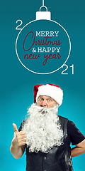 Image showing Emotional Santa Claus greeting with New Year 2021 and Christmas. Flyer with copyspace