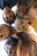 Image showing Interracial group of kids, girls and boys playing together at the park in summer day