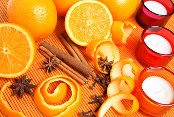 Image showing Oranges, spices and candles