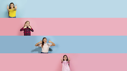 Image showing Young happy caucasian kids gesturing isolated on multicolored studio background. Human emotions, facial expression concept. Collage