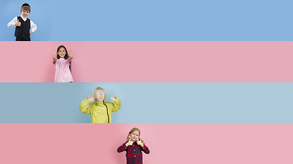 Image showing Young happy caucasian kids gesturing isolated on multicolored studio background. Human emotions, facial expression concept. Collage