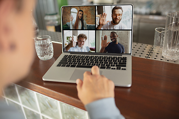 Image showing Remote working. Workplace in bar, restaurant office with PC, devices and gadgets.