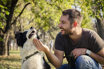 Image showing Man with his dog