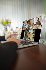 Image showing Remote working. Workplace in bar, restaurant office with PC, devices and gadgets.