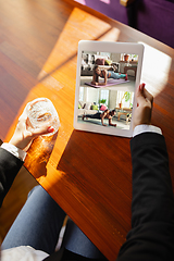 Image showing Remote working. Workplace in bar, restaurant office with PC, devices and gadgets.