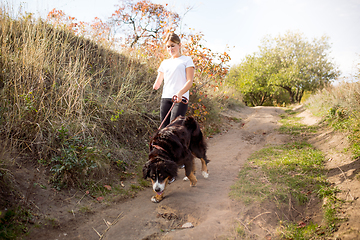 Image showing Disabled woman walking down and training outdoors in forest