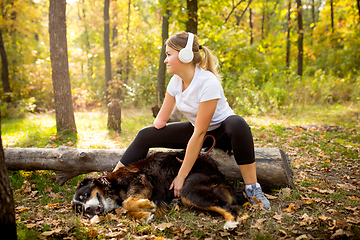 Image showing Disabled woman walking down and training outdoors in forest