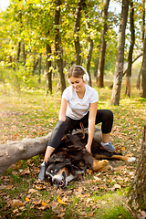 Image showing Disabled woman walking down and training outdoors in forest