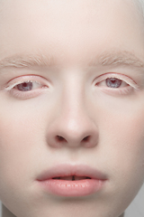 Image showing Close up portrait of beautiful albino woman isolated on studio background. Beauty, fashion, skincare, cosmetics concept. Details.