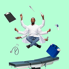 Image showing Handsome multi-armed doctor levitating isolated on green studio background with equipment