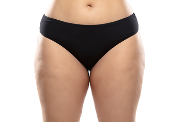 Image showing Overweight woman with fat cellulite legs and buttocks, obesity female body in black underwear isolated on white background