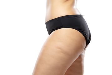 Image showing Overweight woman with fat cellulite legs and buttocks, obesity female body in black underwear isolated on white background