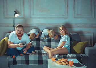 Image showing Mother, father and kids at home having fun, comfort and cozy concept