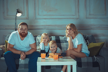 Image showing Mother, father and kids at home having fun, comfort and cozy concept