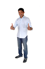 Image showing Handsome man standing with his thumps up