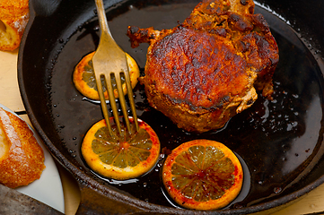 Image showing pork chop seared on iron skillet