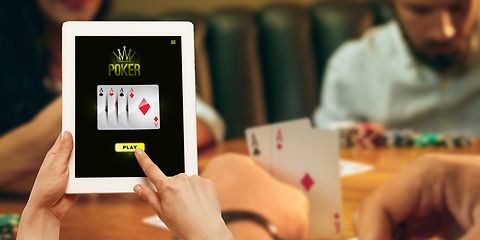 Image showing Online gambling, casino concept. Hand holding device with lottery, casino cover