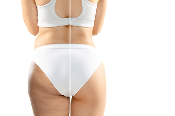 Image showing Overweight woman with fat cellulite legs and buttocks, obesity female body in white underwear comparing with fit and thin body isolated on white background