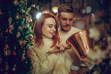 Image showing Smiling family, couple looking for home decoration and holiday\'s gifts in household store