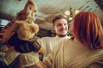 Image showing Smiling family, couple looking for home decoration and holiday\'s gifts in household store