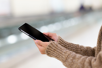 Image showing Woman touch on screen of mobile phone