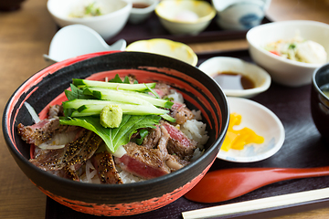 Image showing Grilled sliced of beef rice bowl