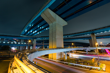 Image showing Traffic and over head highway at night 