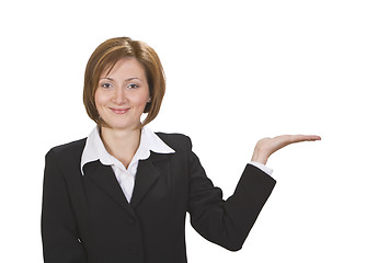 Image showing Businesswoman presenting something