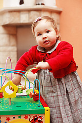 Image showing Cute baby with toy