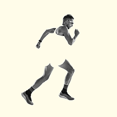 Image showing Young caucasian sportsman isolated on studio background, modern artwork. Healthy lifestyle, movement, action, motion, advertising and sports concept. Abstract design.