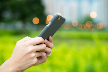 Image showing Woman use of mobile phone at outdoor