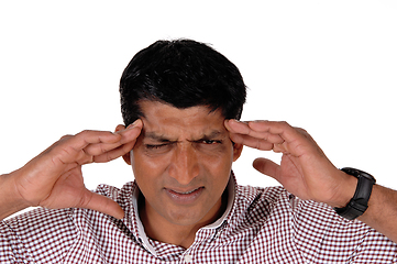 Image showing Man with severe headache holding his head