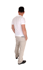 Image showing Man standing relaxed in casual clothing from the back