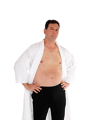 Image showing Man standing in bathrobe shirtless