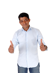 Image showing Handsome man standing with two thumps up