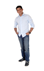 Image showing Relaxed Indian man standing in jeans and sneakers