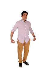 Image showing Poor East Indian man showing empty pockets