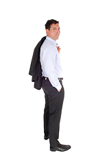 Image showing A business man standing with his jacked over shoulder