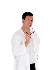 Image showing Tall handsome man in white bathrobe