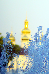 Image showing fountains on the background of golden domes