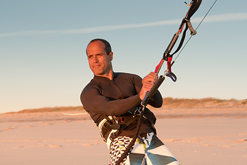 Image showing Kite surfer watching the waves