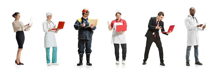 Image showing Group of people with different professions working isolated on white studio background, horizontal