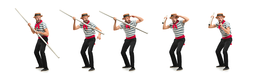 Image showing Handsome man gondolier with oar posing isolated over white studio background. Collage