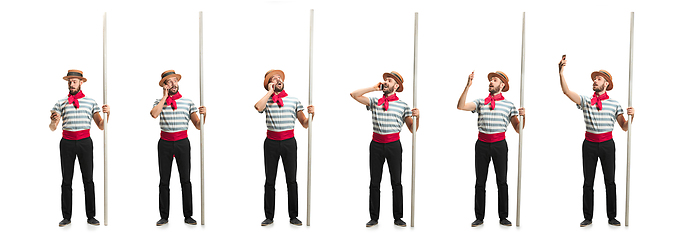 Image showing Handsome man gondolier with oar isolated over white studio background