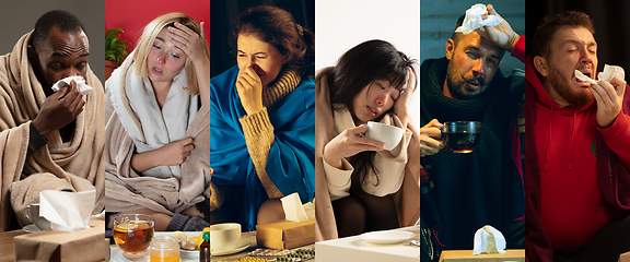 Image showing Young people wrapped in a plaid looks sick, ill, sneezing and coughing sitting at home indoors